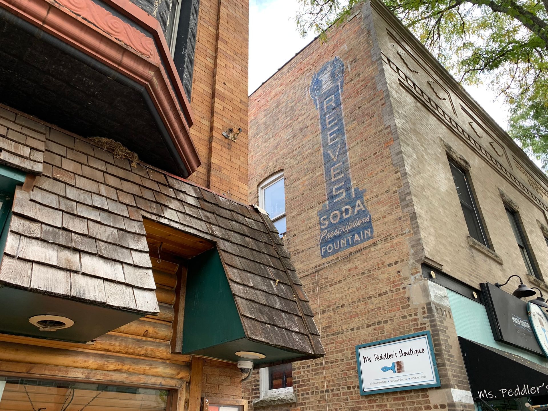 Brick building with a faded 