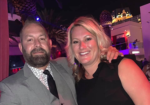 Blonde Woman And A Man With Mustache – Carmel, IN – The Bond Group