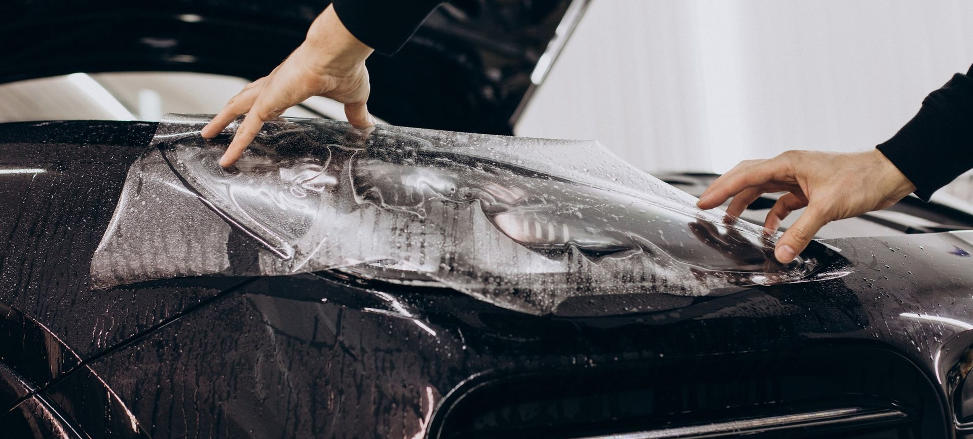 Professional LLumar installation on vehicle