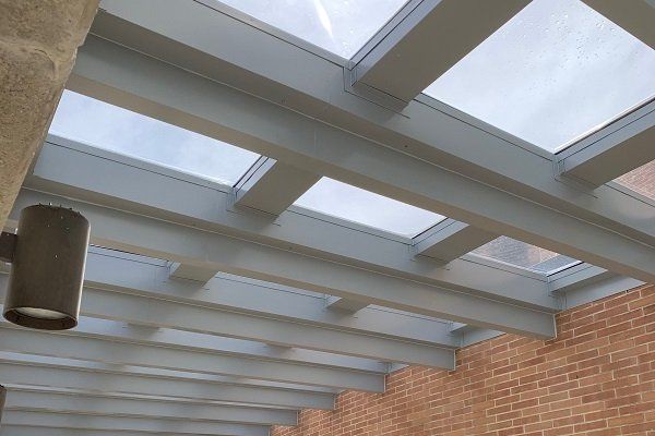 Blue Corrugated Metal Roof — Indianapolis, IN — Brown's Roofing, Inc. Blue Corrugated Metal Roof — Indianapolis, IN — Brown's Roofing, Inc.