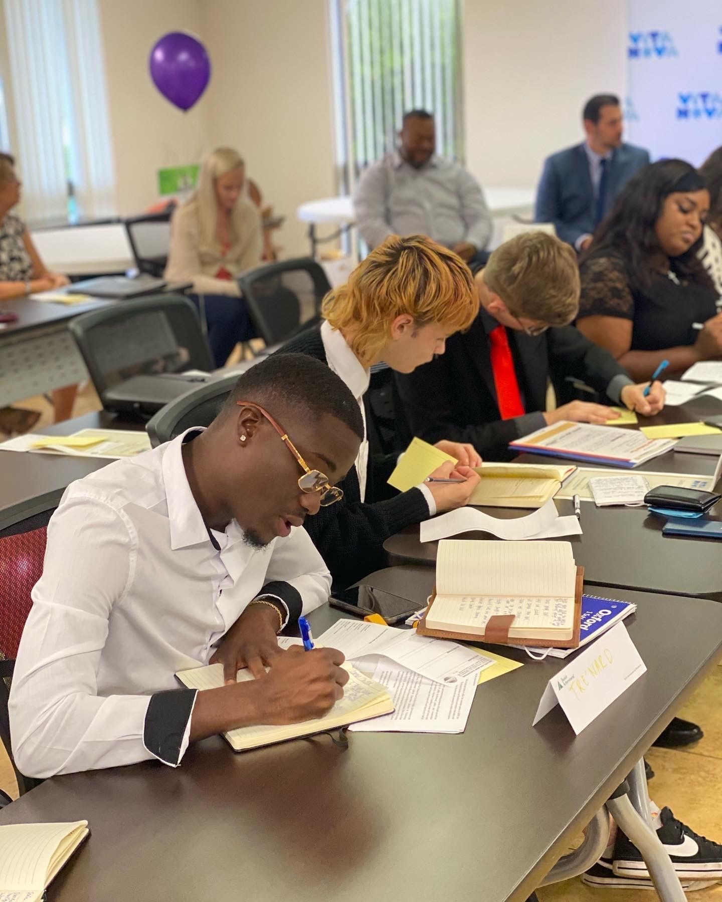image of two people sitting across from each other at a table