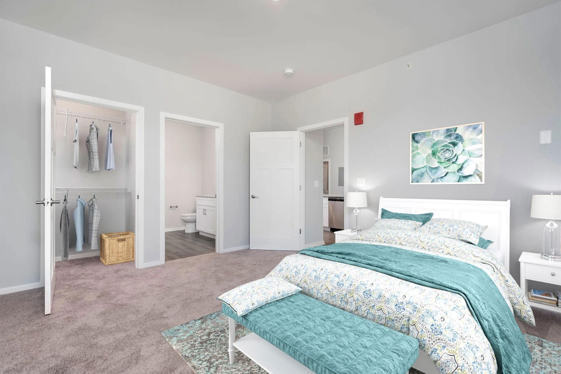 A bedroom with a large bed and a painting on the wall.