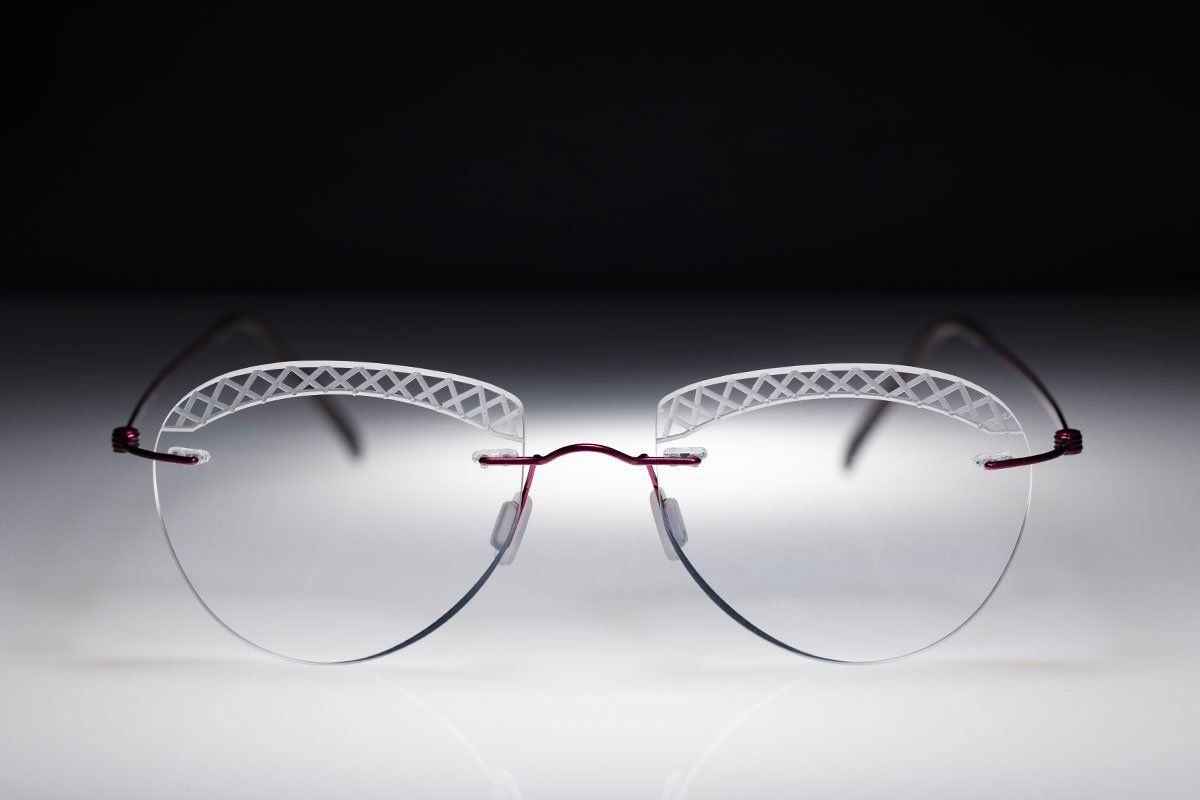 light rimless glasses with engravings