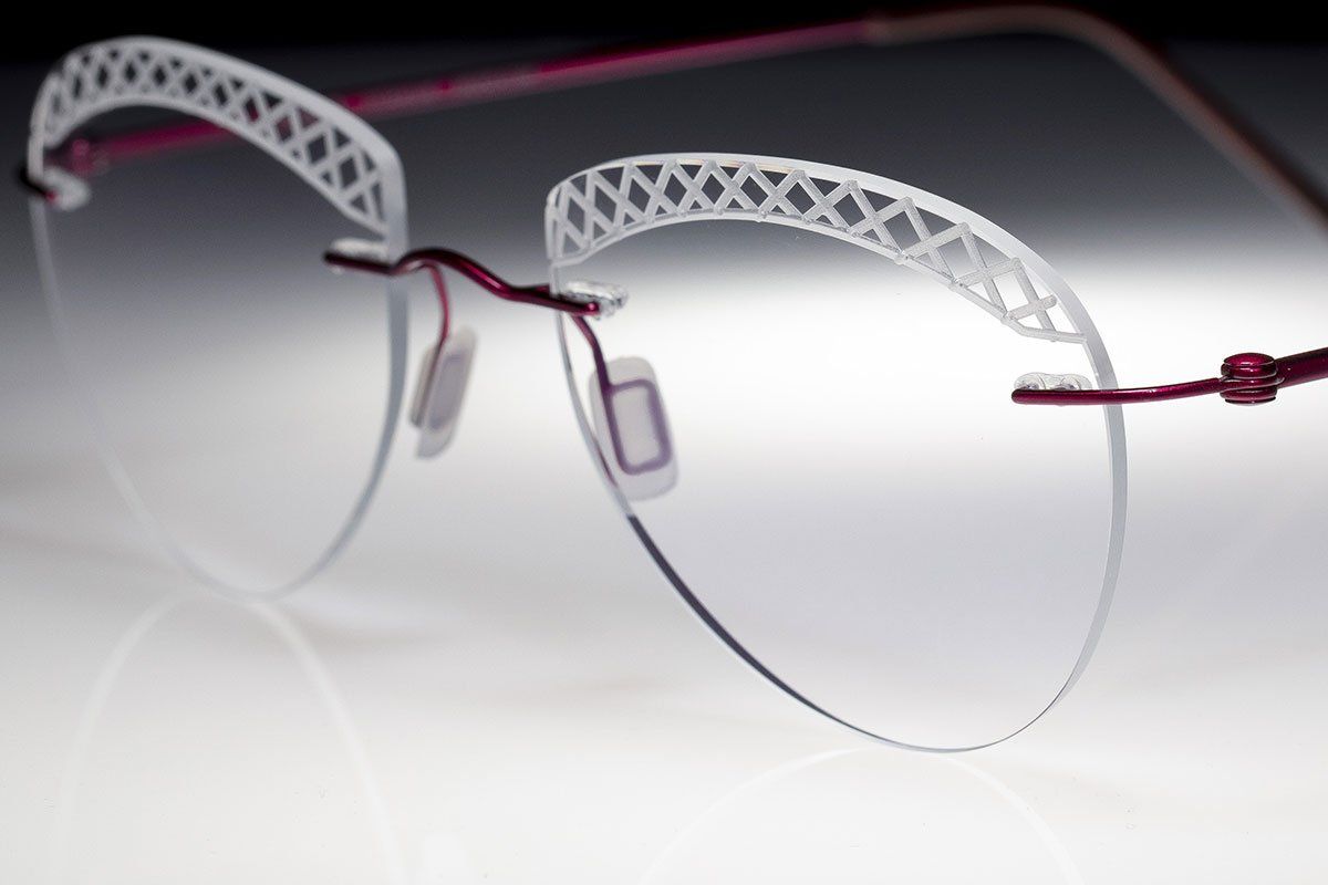 light rimless glasses with engravings