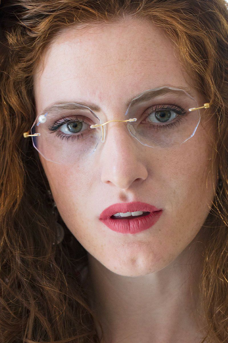 light jeweled frameless glasses customized by hands