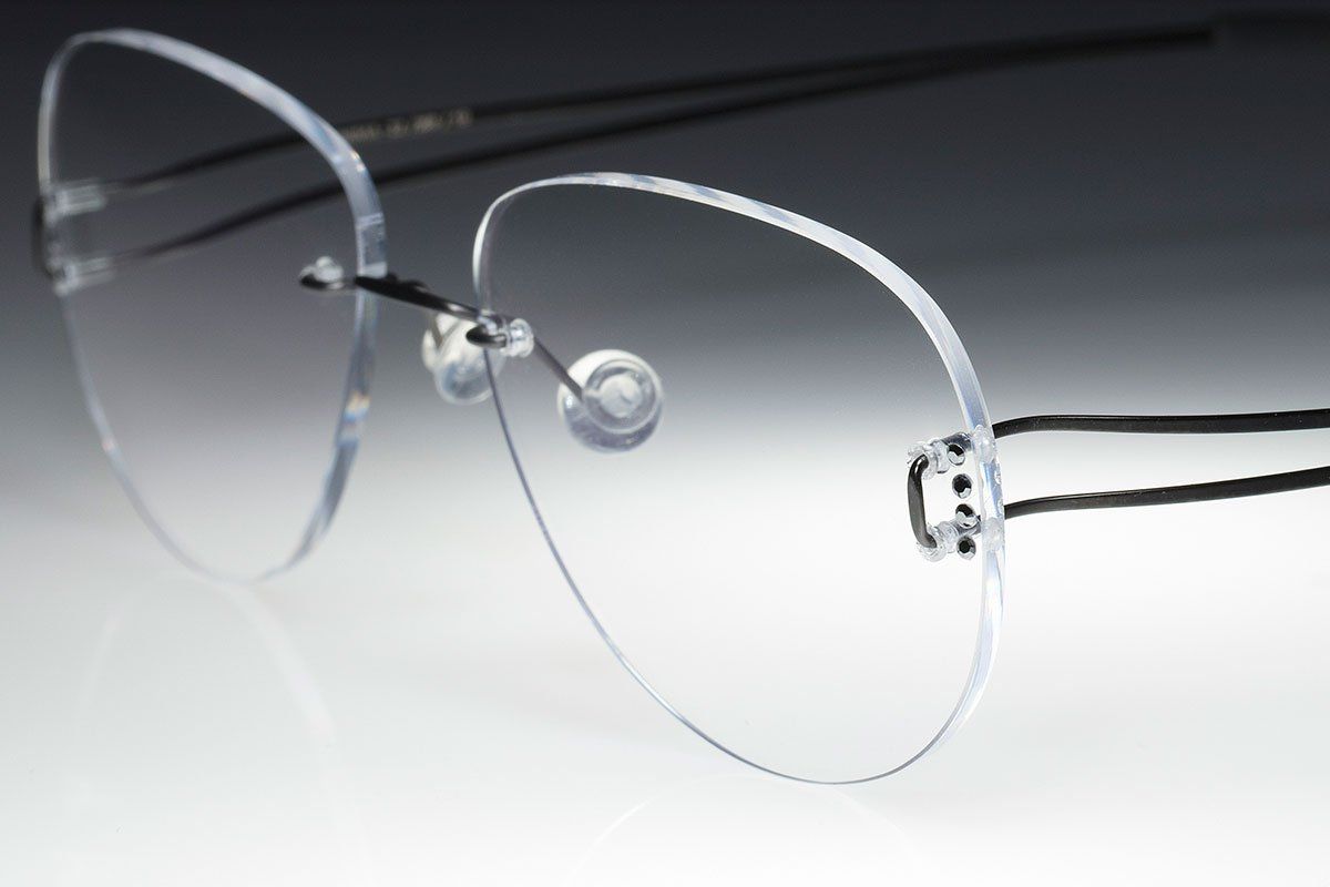 light rimless teardrops glasses form man