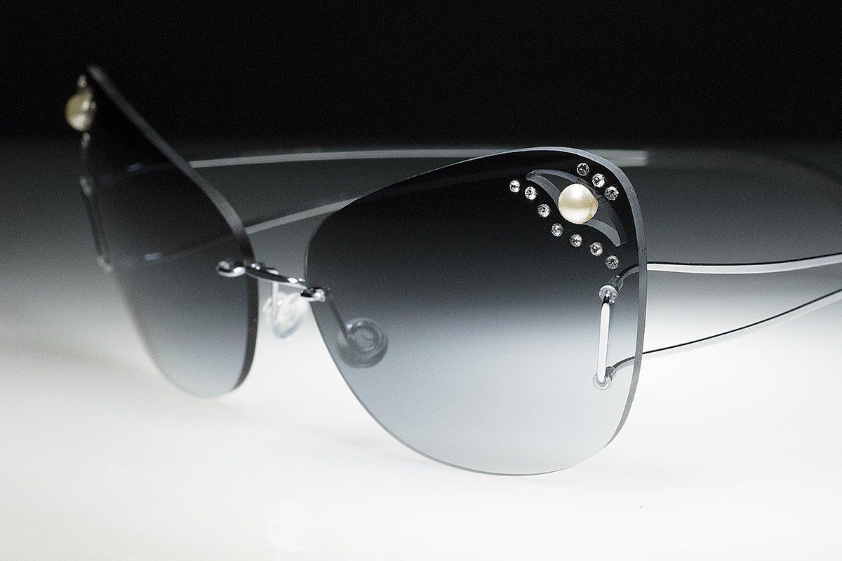 occhiali da sole leggeri senza montatura con perle