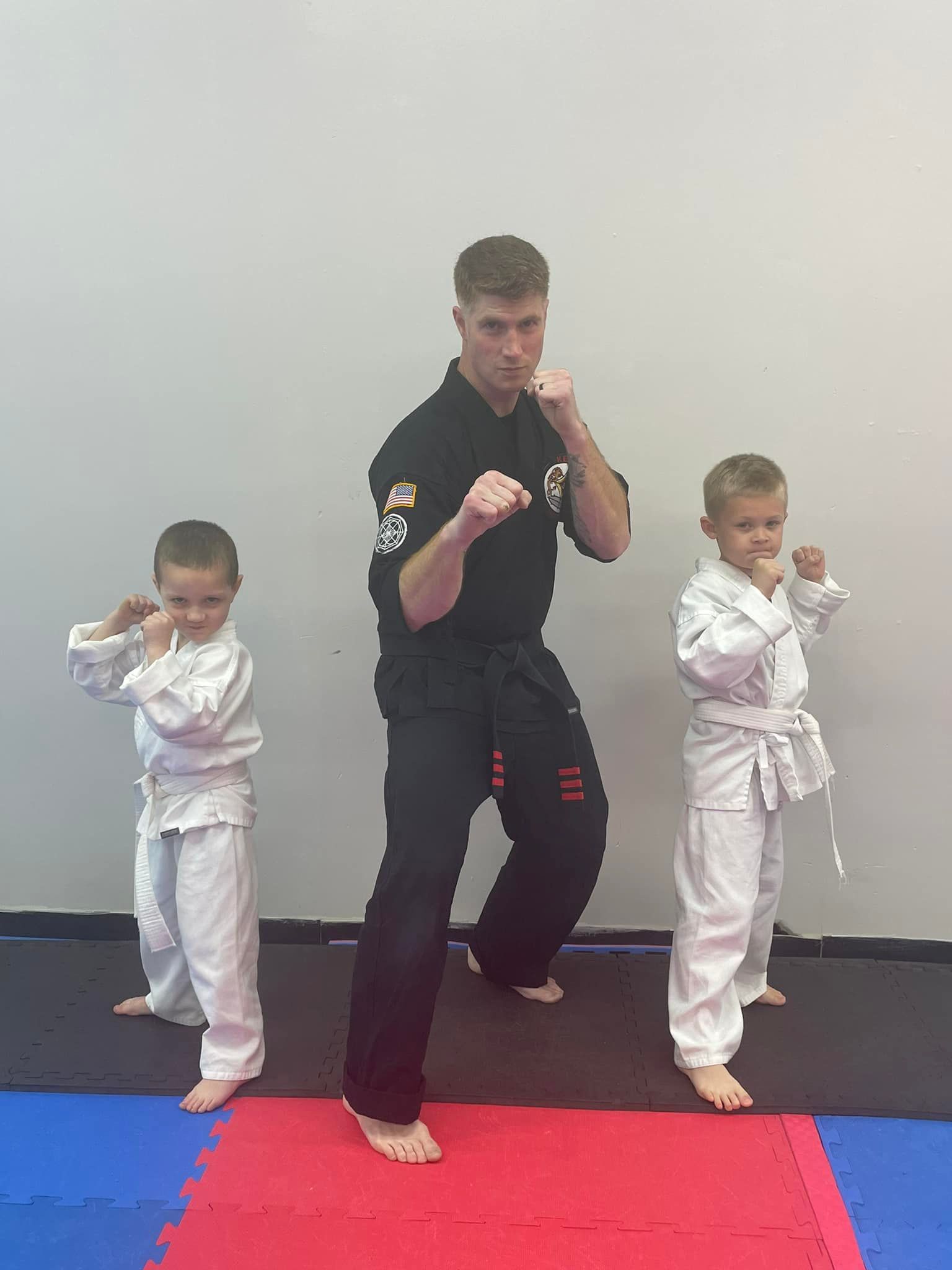 An aerial view of a city skyline at sunset.