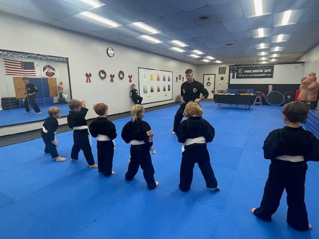 An aerial view of a city skyline at sunset.
