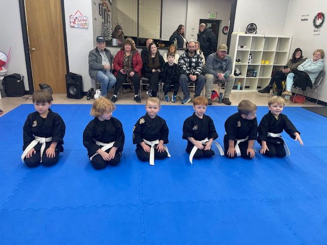 A blurry picture of a bunch of colorful lights on a dark background.