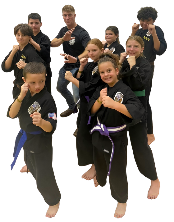 a group of children are practicing martial arts together .