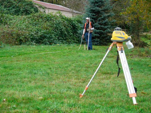 Photo of Dick Gudmunson performing a soil survey