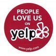 A red circle with the words `` people love us on yelp '' on it.