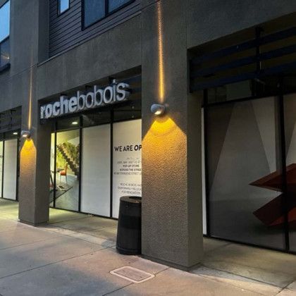 A building with a sign that says rochebobois on it