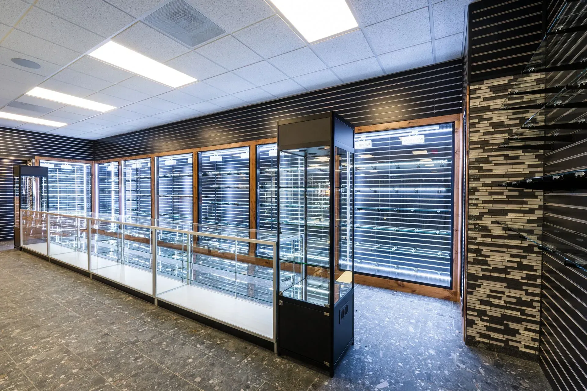 A large room with a lot of glass display cases