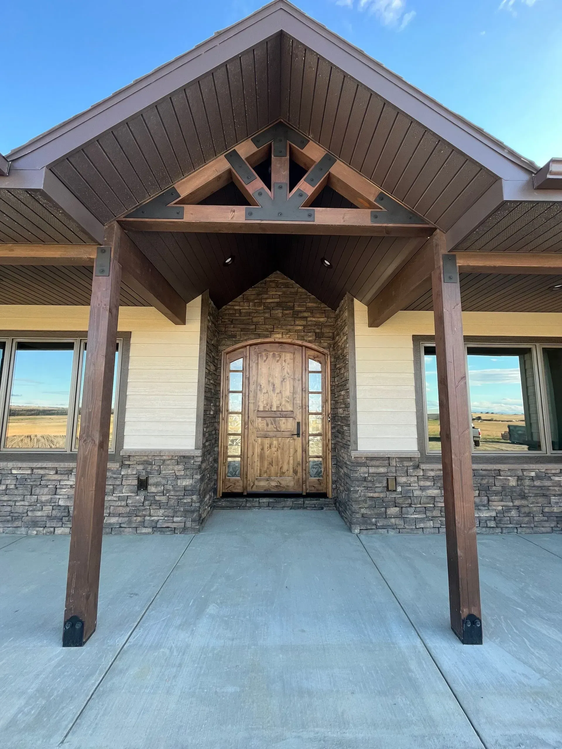 The front of a house with a wooden door