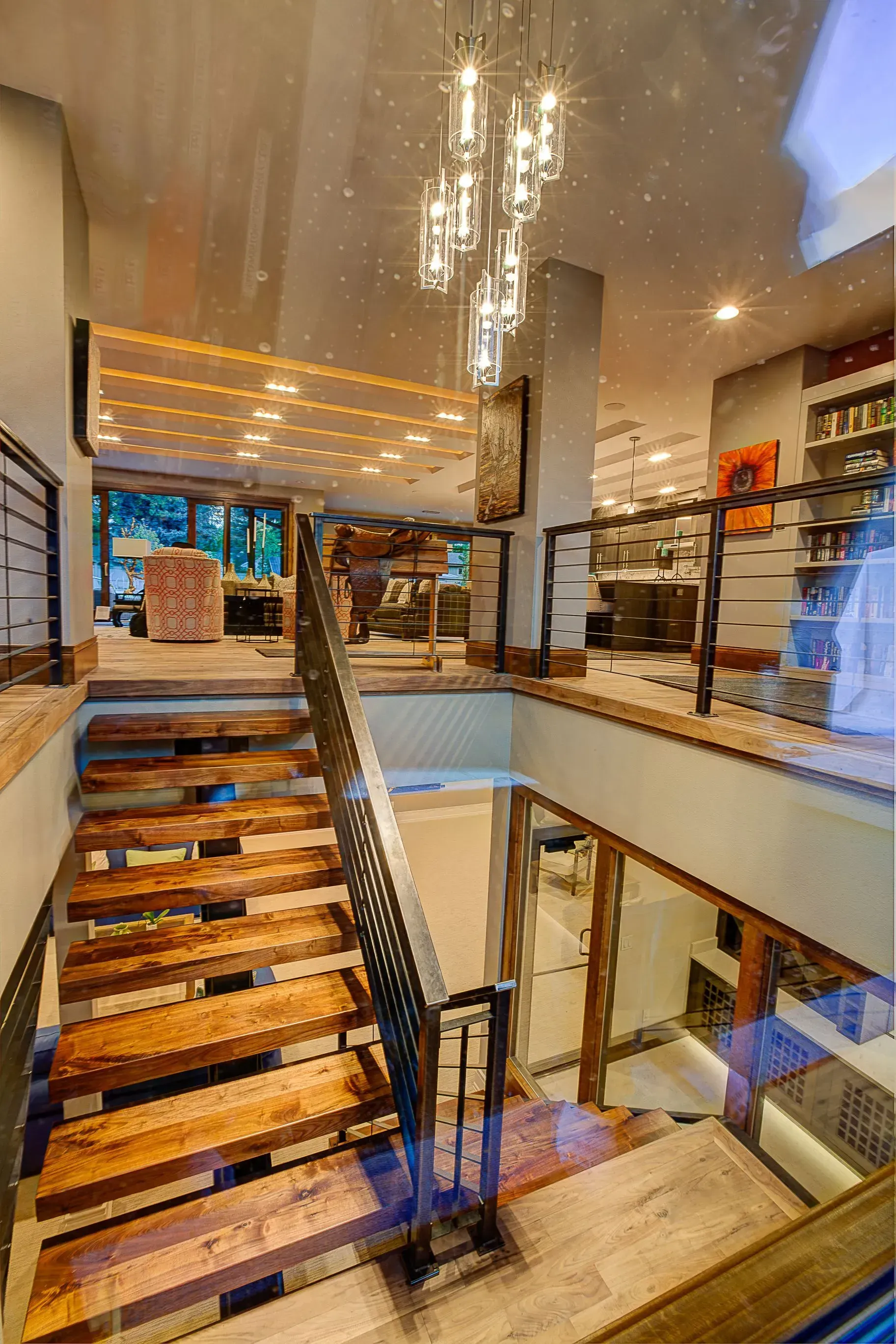 A wooden staircase leading up to the second floor of a house.