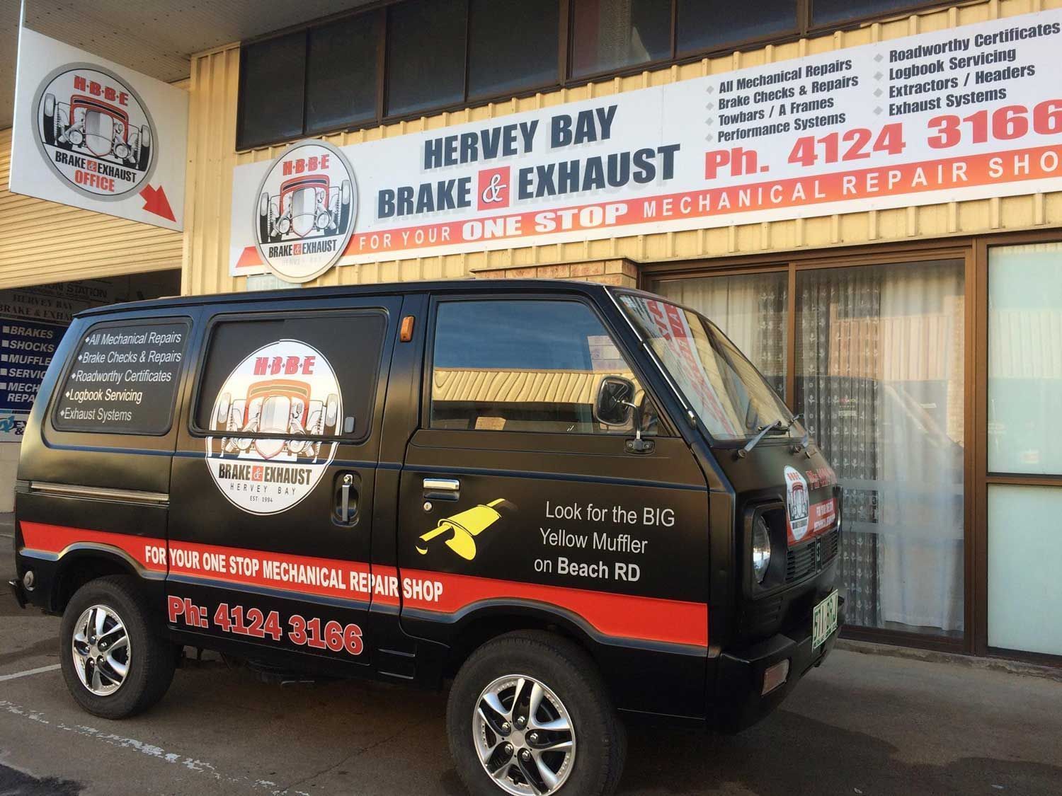 A Black Van Parked Outside a Repair Shop — Hervey Bay Brake and Exhaust in Pialba, QLD
