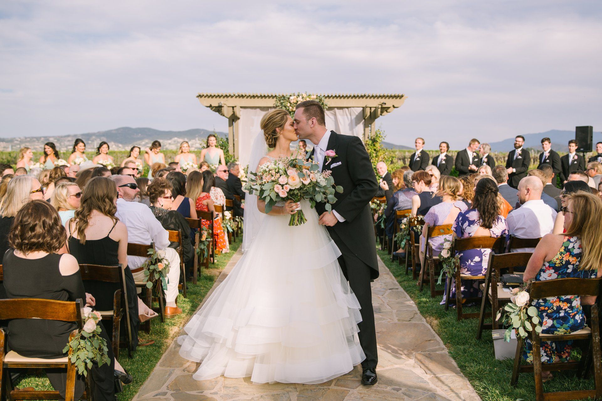 Orange County wedding photography of bride and groom kissing