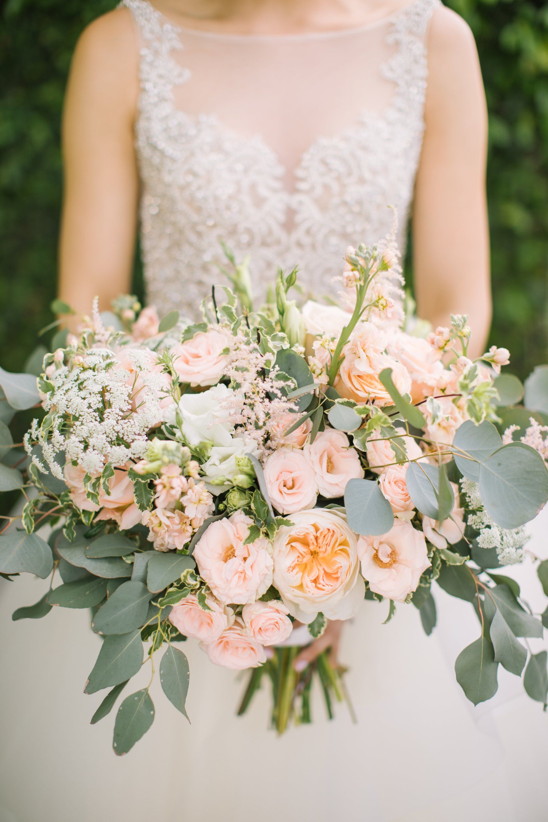 Orange County wedding photography of bride holding flowers