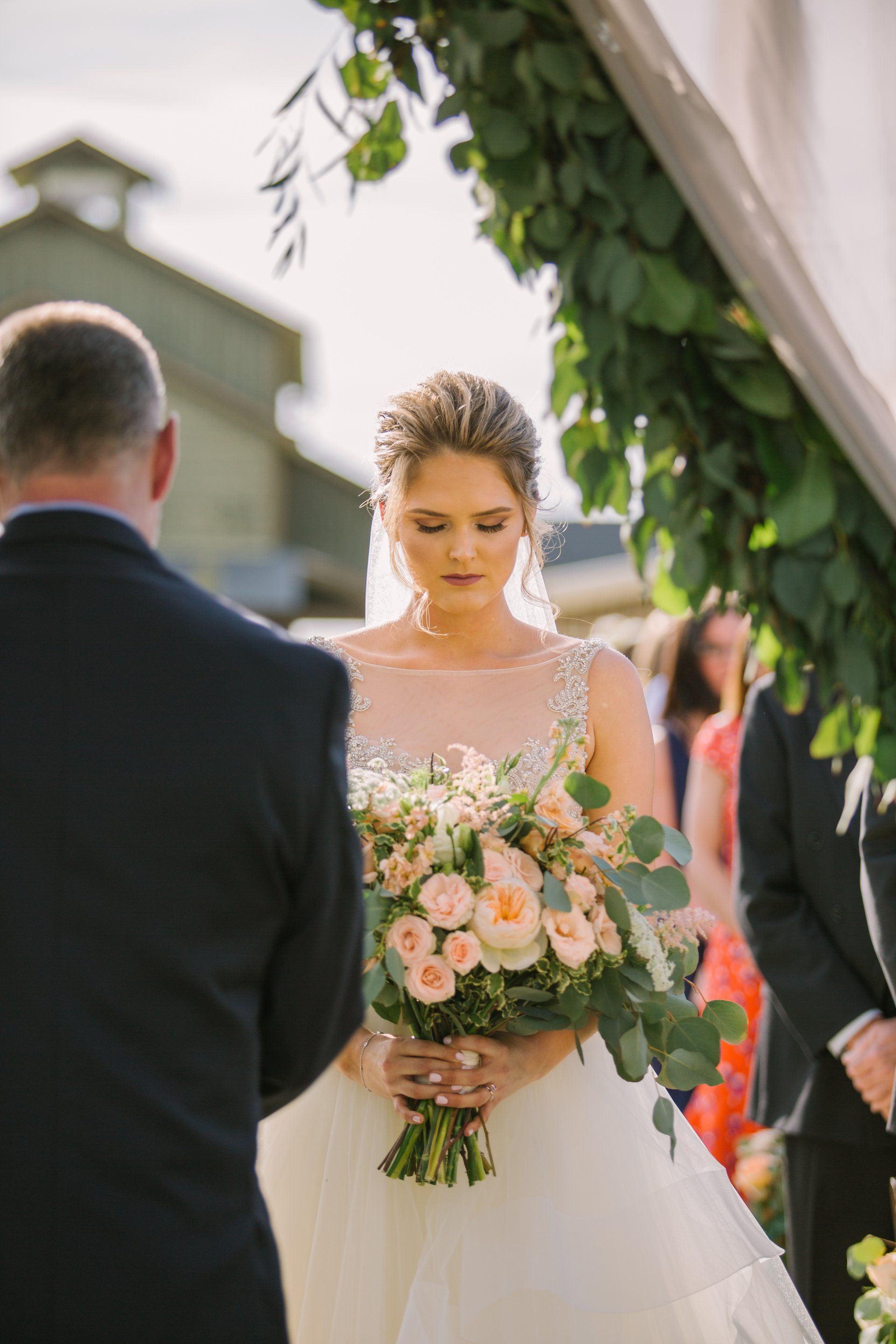 Orange County wedding photography of bride holding flowers