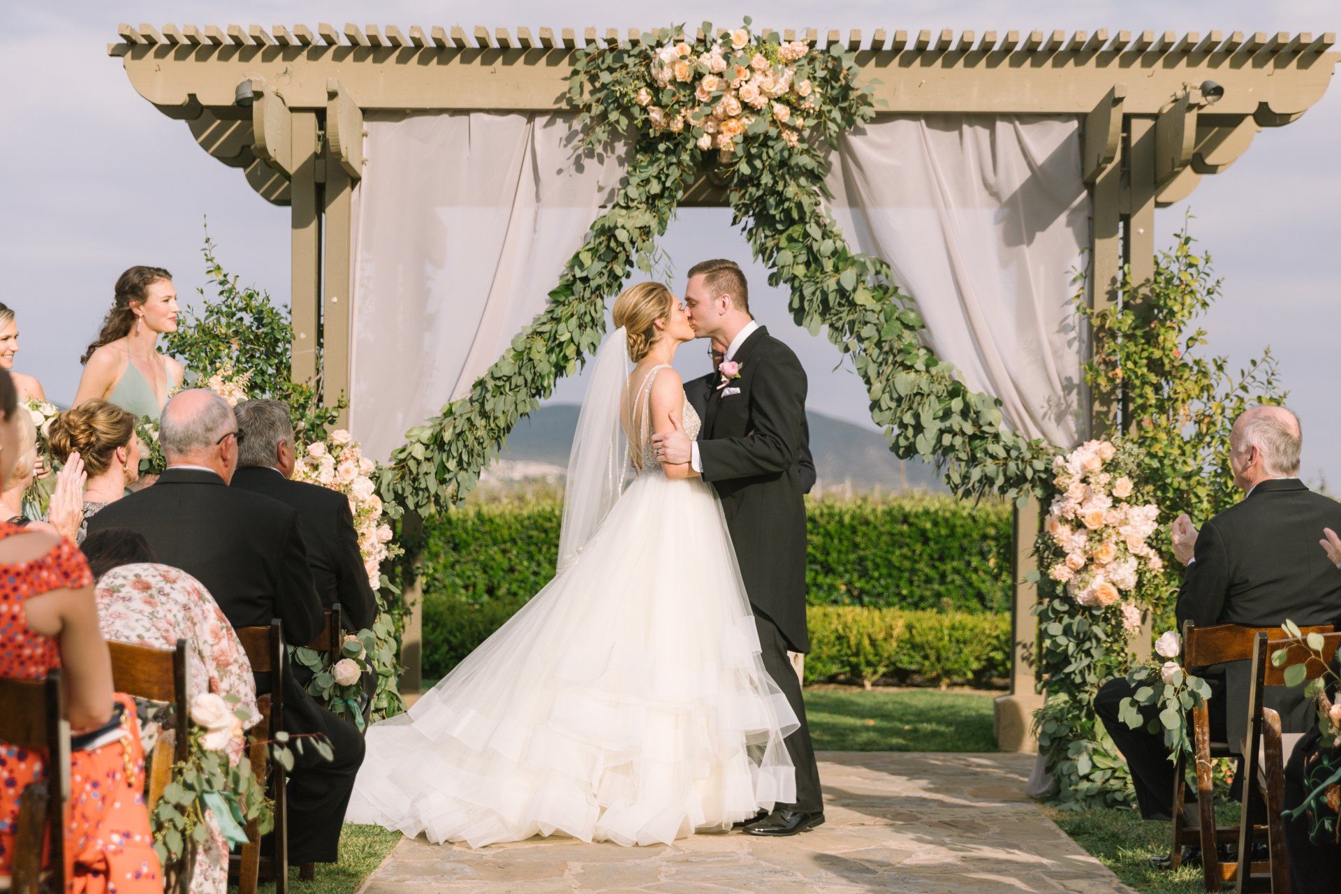 Orange County wedding photography of bride and groom kissing