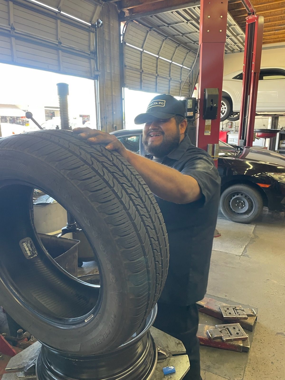 Abraham fixes a tire