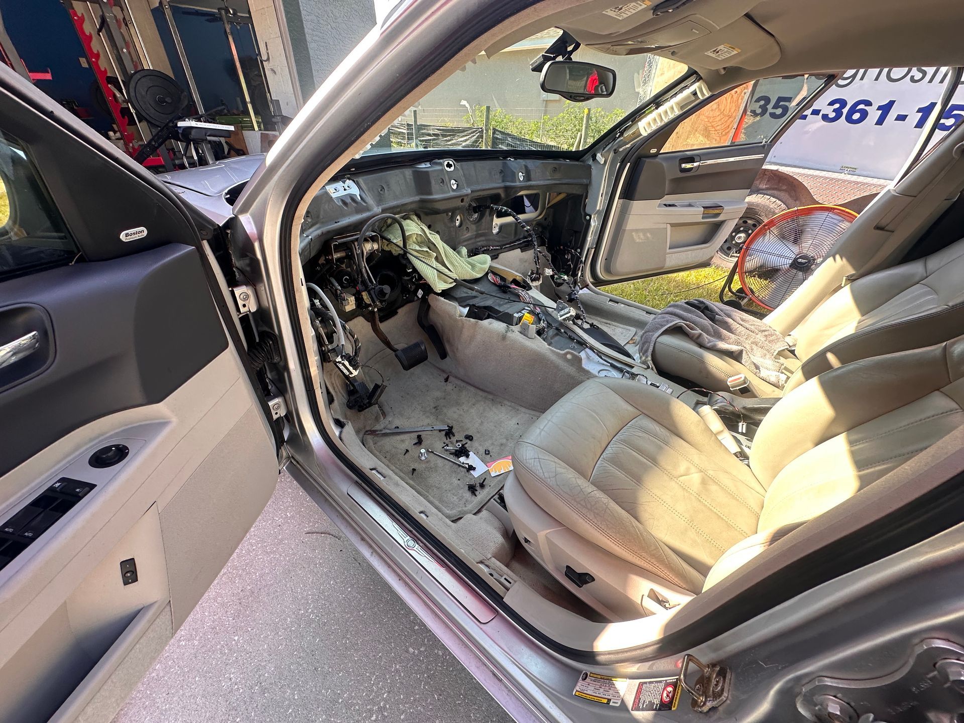 Interior of a car disassembled. Dashboard, seats, and floor are visible | 3T’s Mobile Automotive Repair Inc.