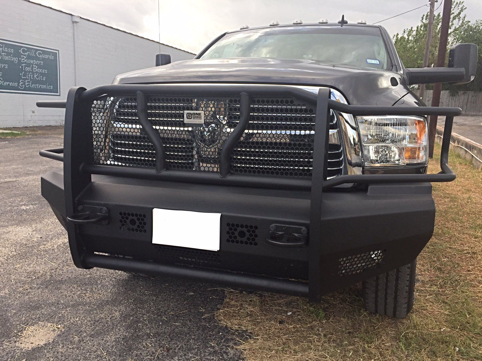 black grill guard on black pickup truck