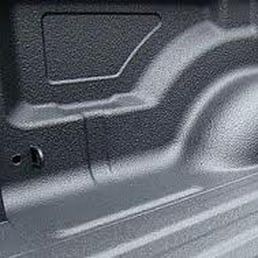 detail shot of black spray-in truck bed liner