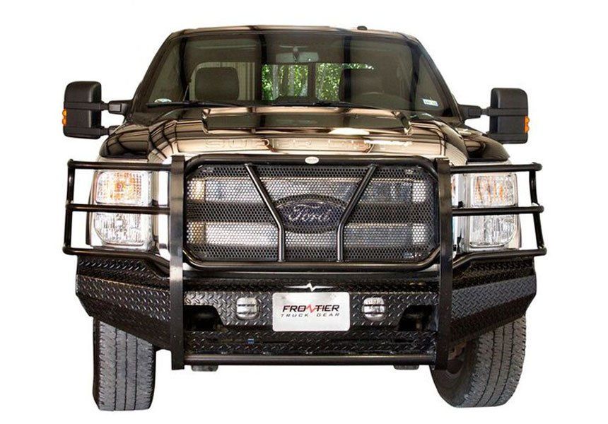 front view of black grill guard and frontier bumper on gold Ford pickup