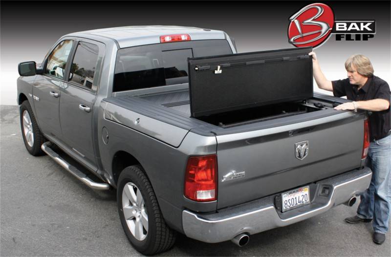 rear view of dark grey Dodge Ram four door pickup with BakFlip folding bed cover