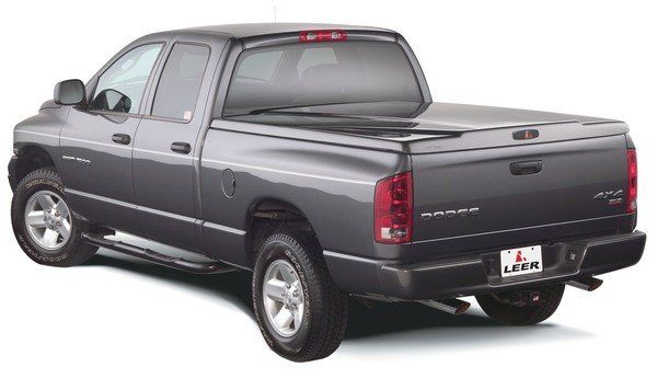 dark grey Dodge pickup truck with closed matching truck bed cover