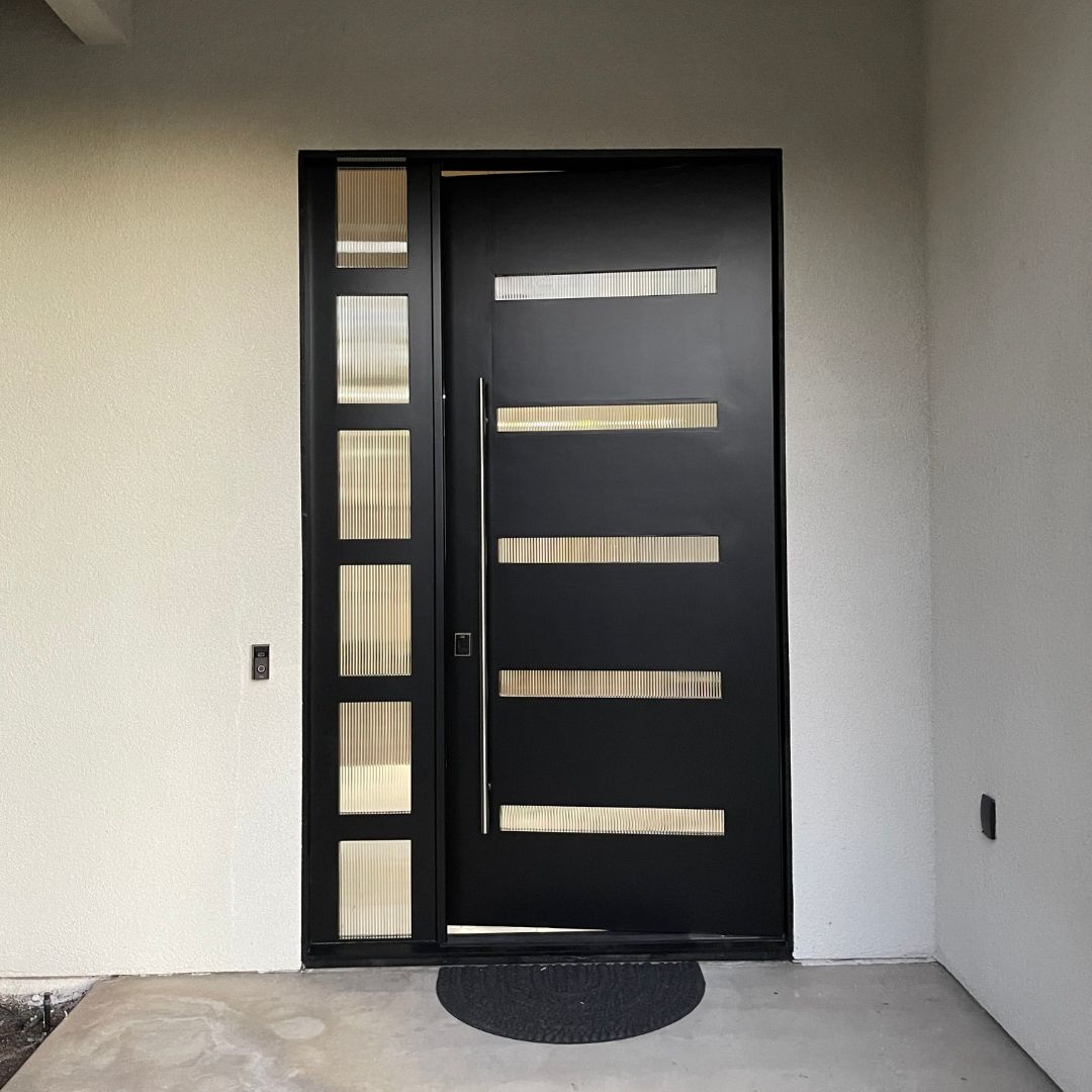 Newly painted exterior door of a Fresno home. Painted with PPG's Break-Through in black, paint has a satin sheen.  