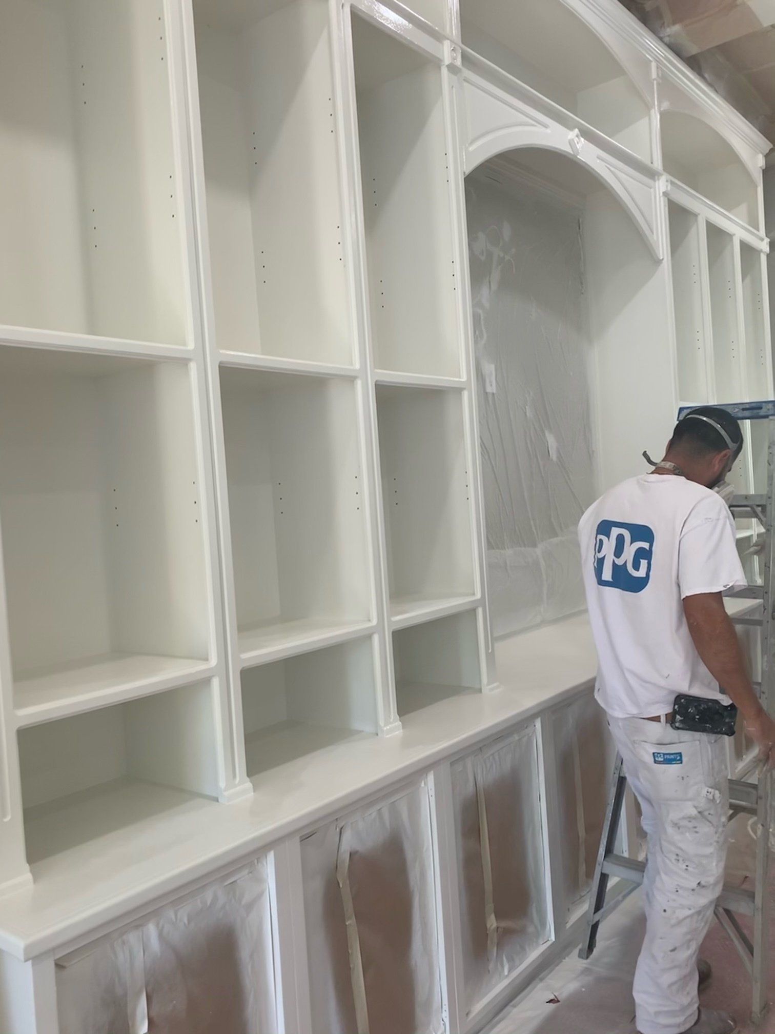 Fresno Home remodel custom built-in shelving in the process of being painted