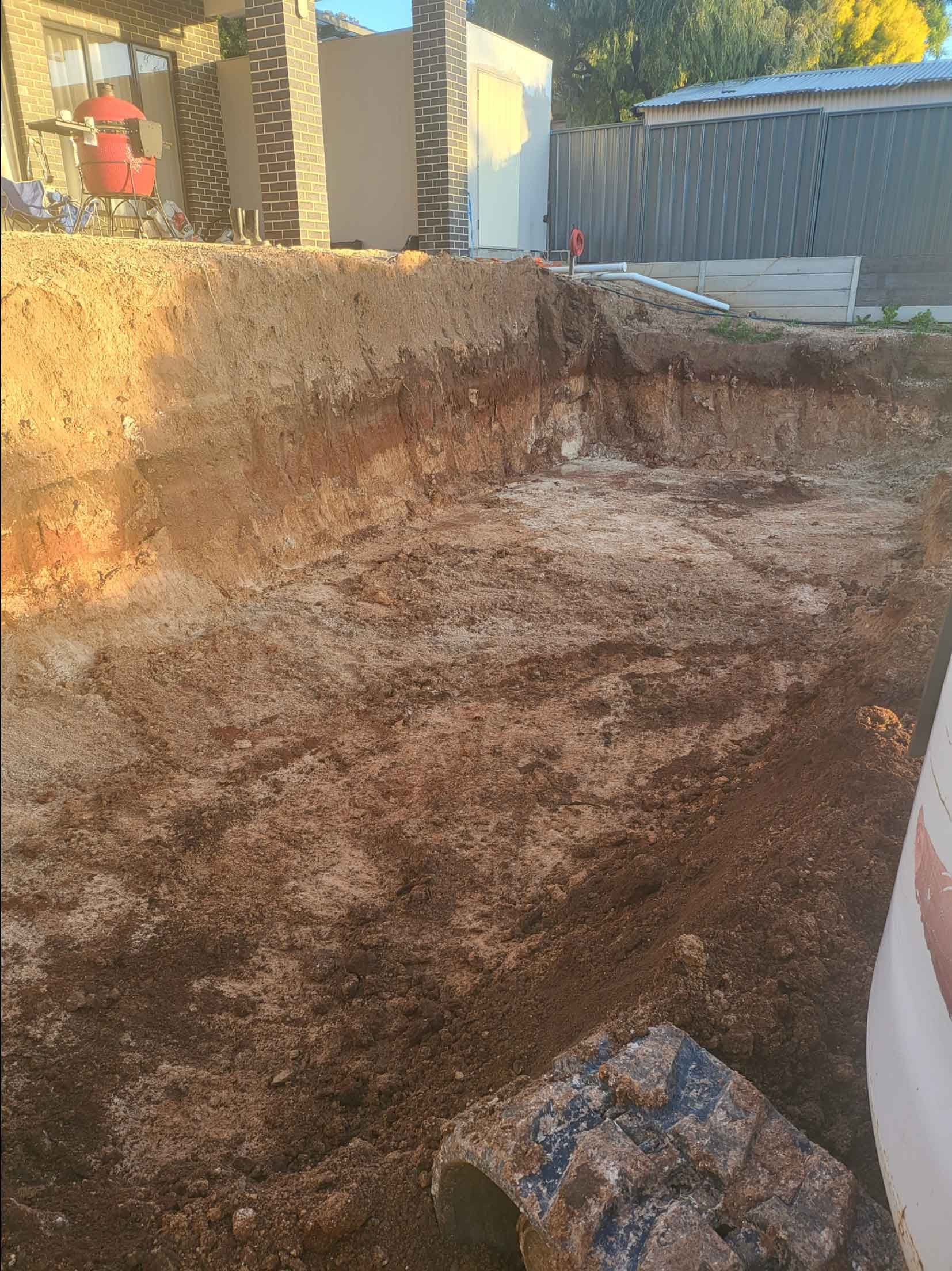 A Large Pile Of Dirt Is Sitting In The Middle Of A Dirt Field – Blackwood SA - Blackwood Earthmoving