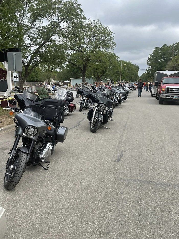 motorcycles lined up on street