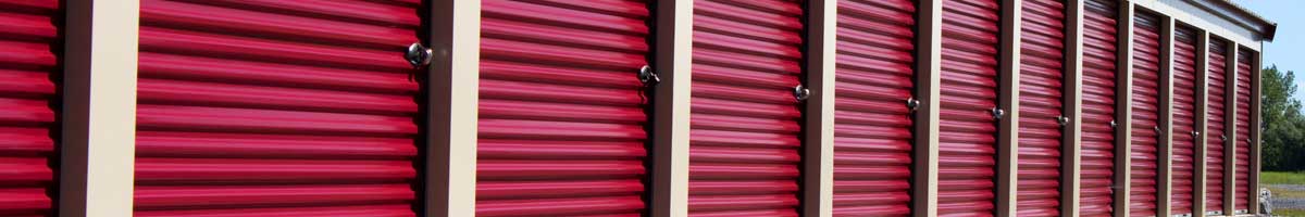 row of locked storage units at All American Airborne Self-Storage