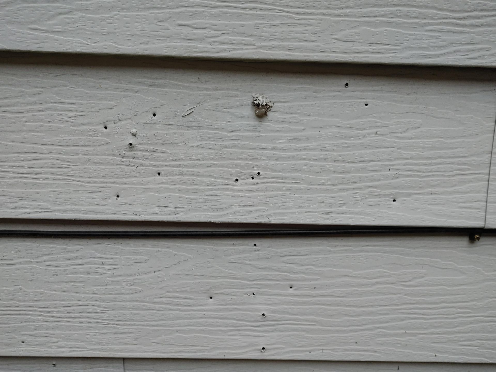 hole in vinyl siding repair south jersey