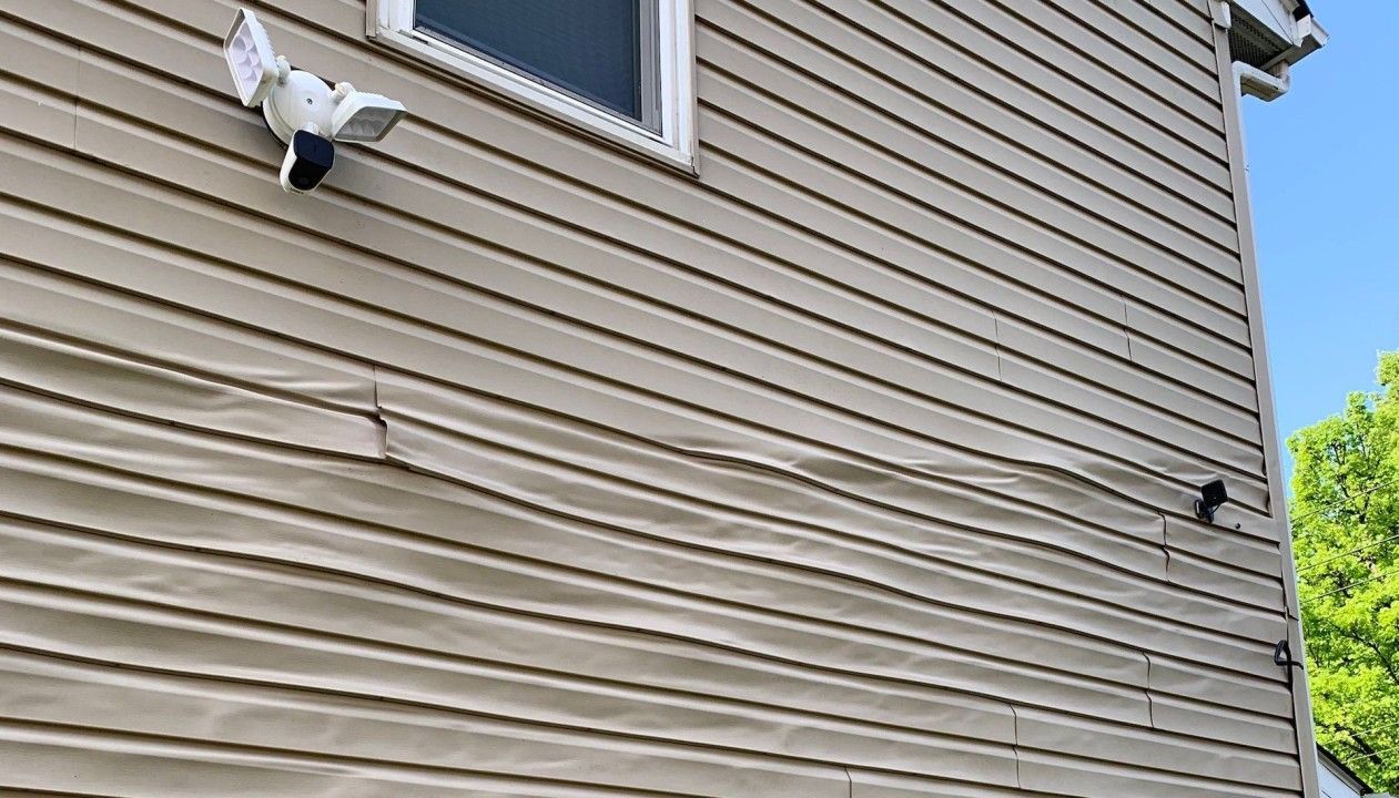 warped siding repair south jersey