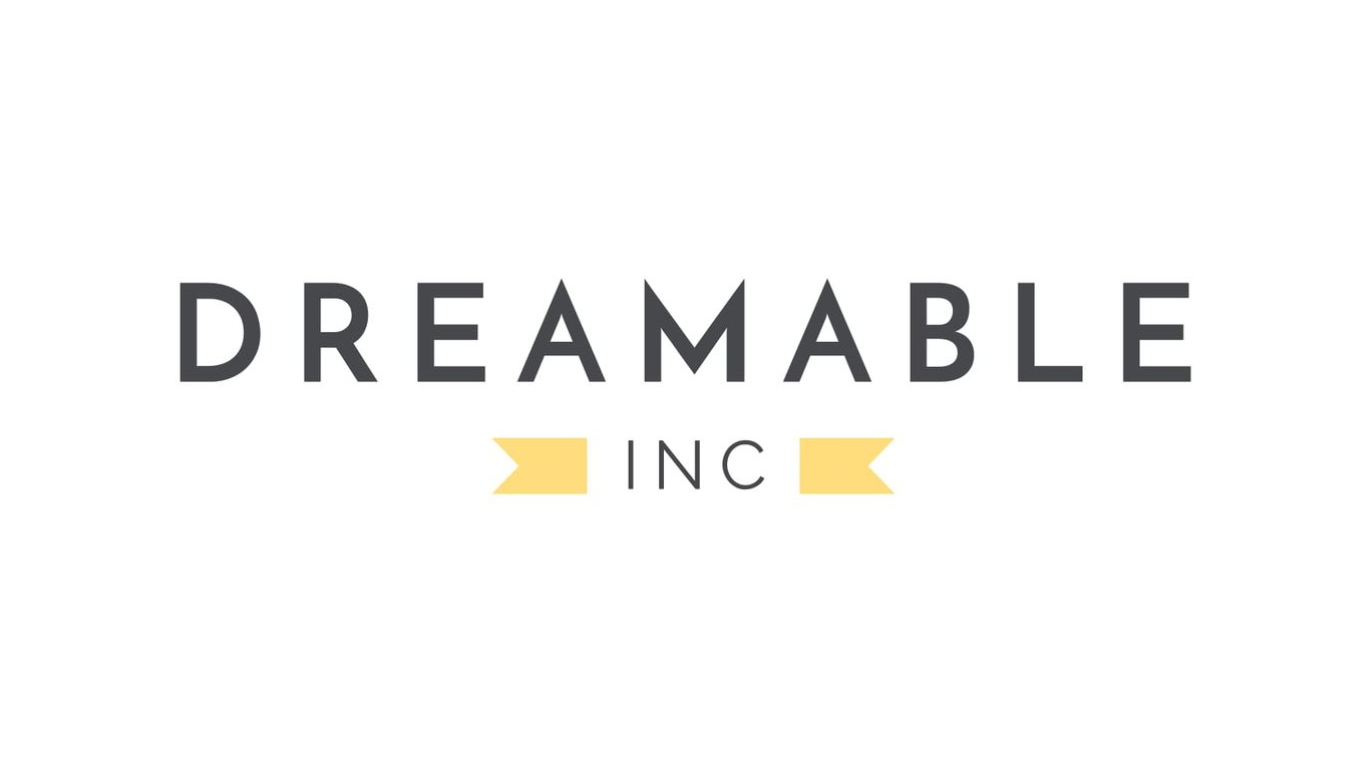 Dreamable Inc. logo in gray text with two yellow banner-like shapes.