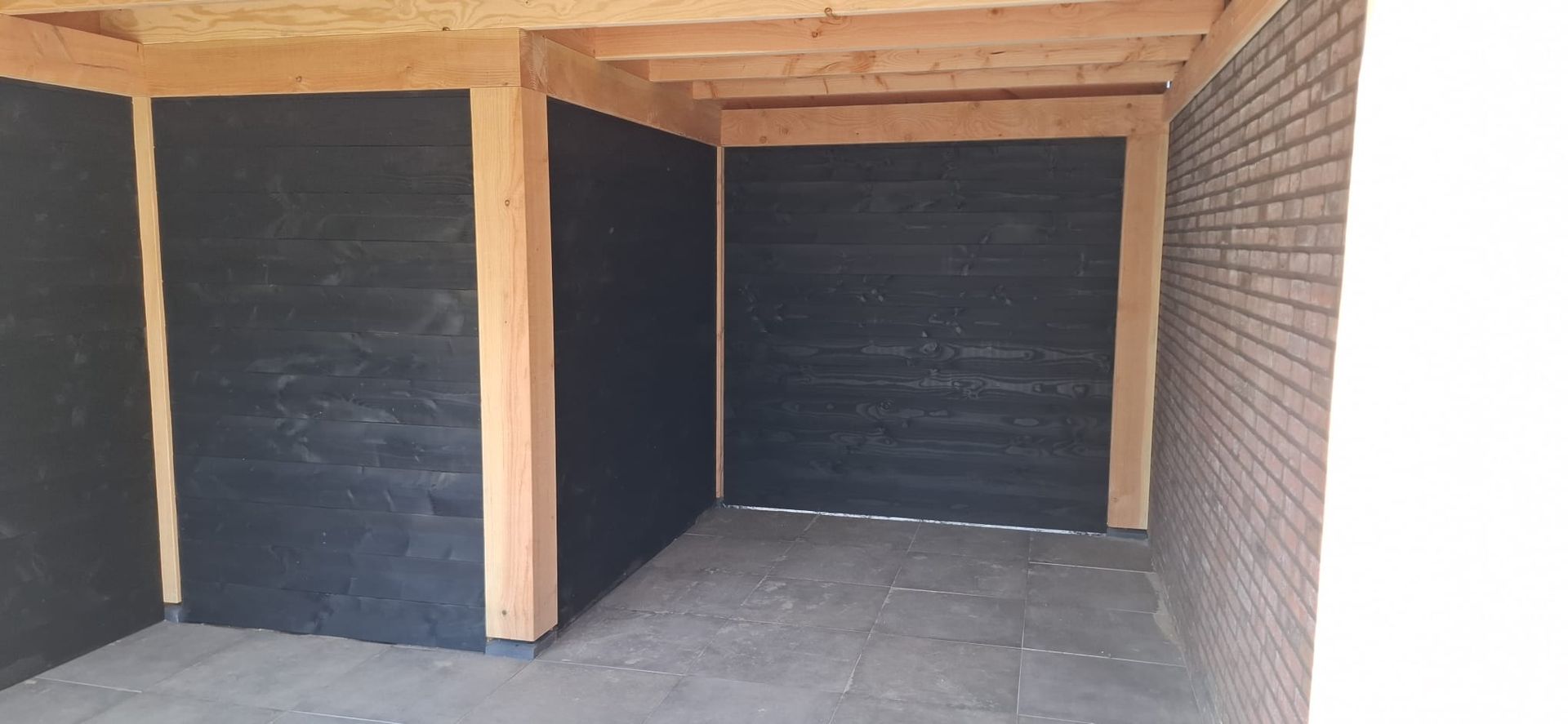 Schuur met zwarte rabatdelen Uden | Smans Houtbouw