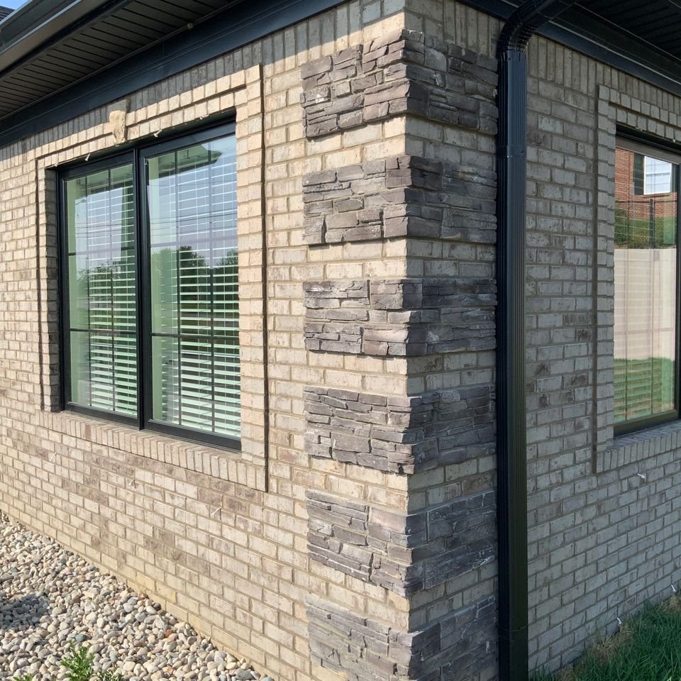 a brick building with a lot of windows on it