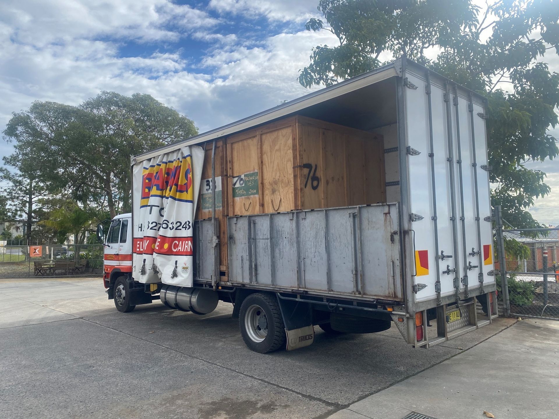 Delivery Truck With a Partially Open Rear Door