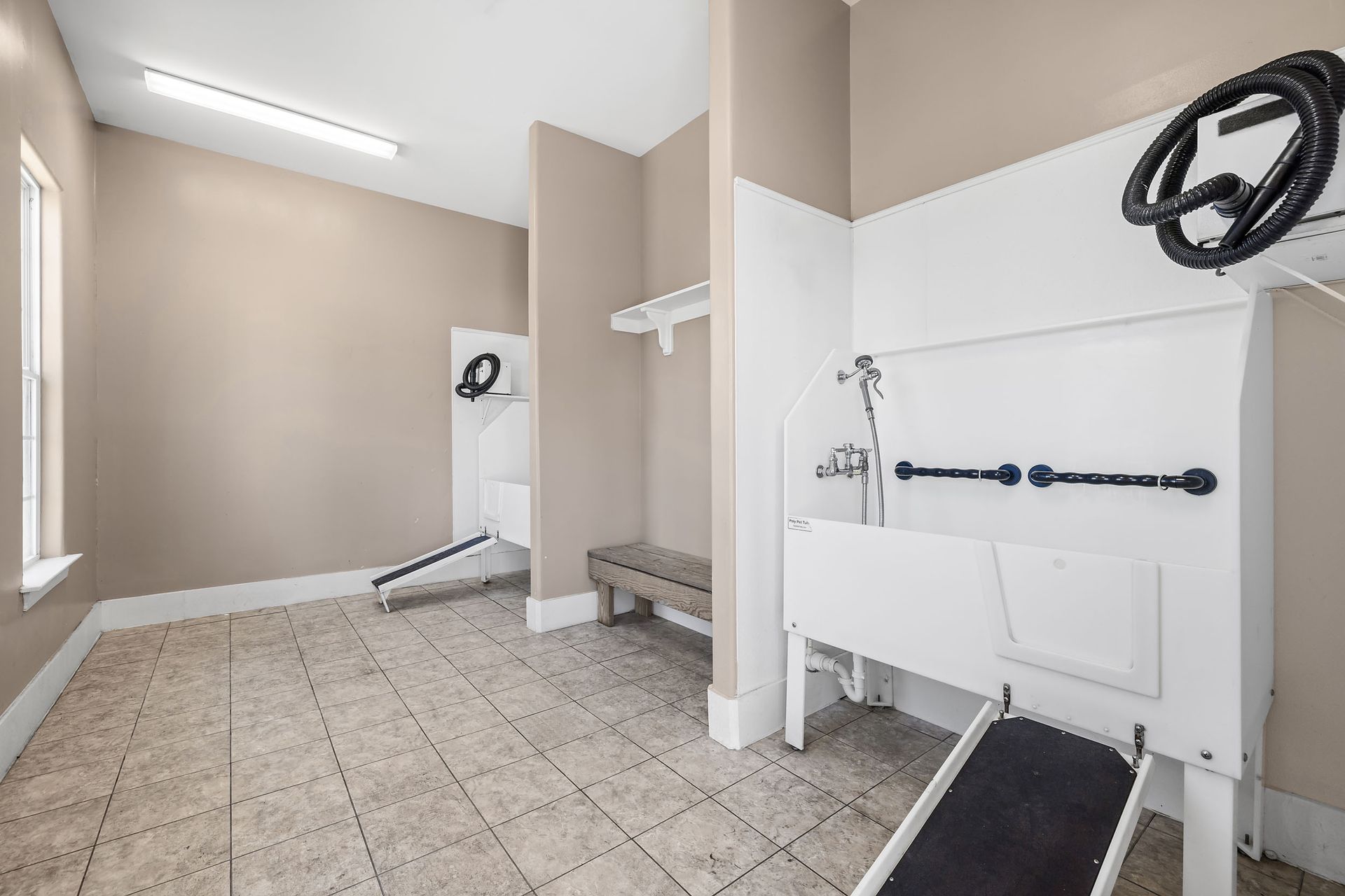 Pet washing station with a sink at Marquis Ellis Crossing offers pet-friendly apartments for rent in Durham, NC.