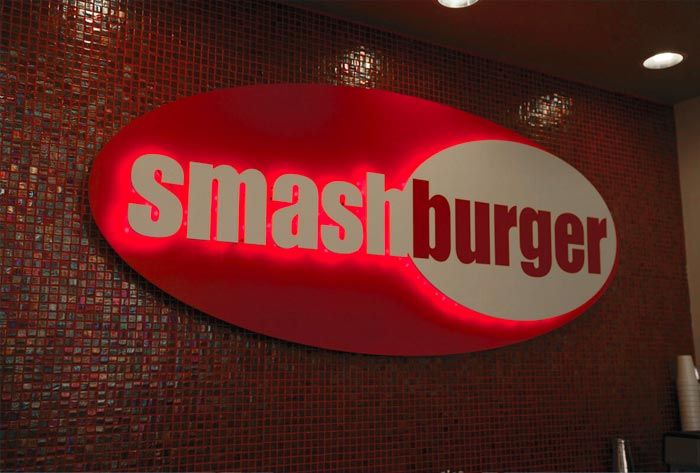 dimensional restaurant sign with top layer back lit