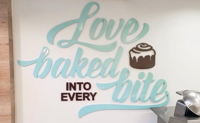 bakery interior signage mounted to wall