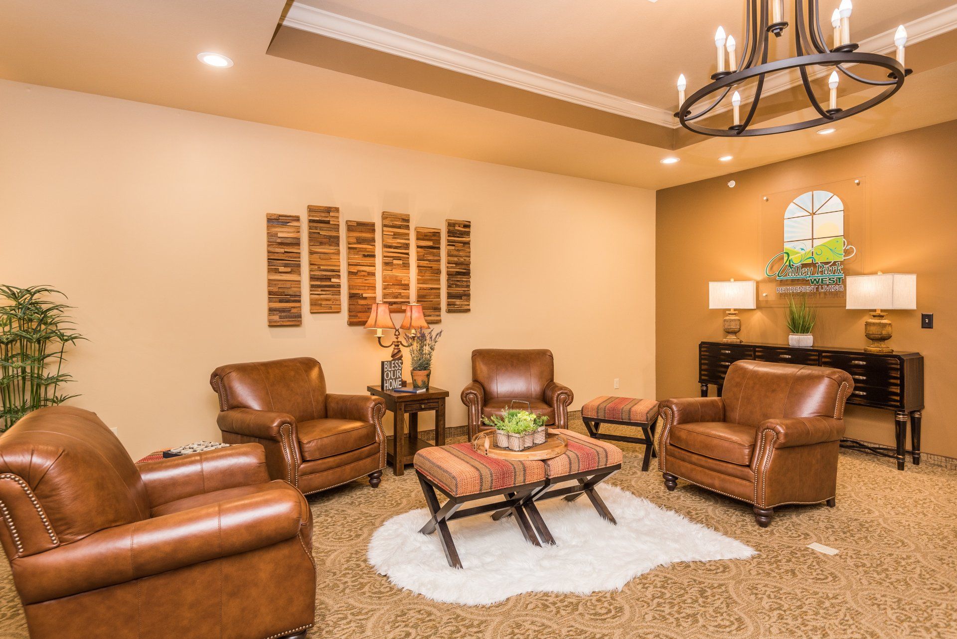 A living room filled with furniture and a chandelier.