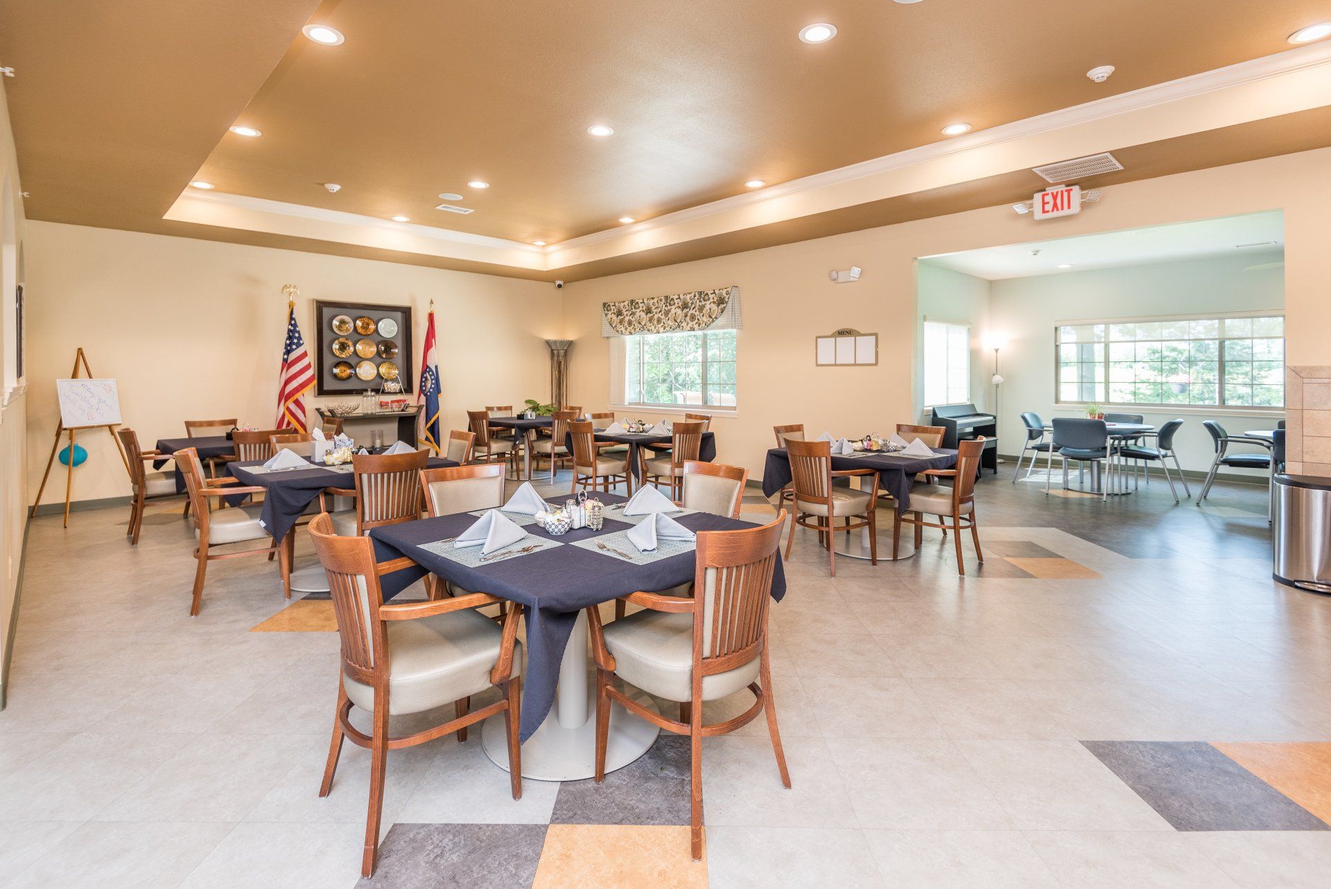 A large dining room filled with tables and chairs.