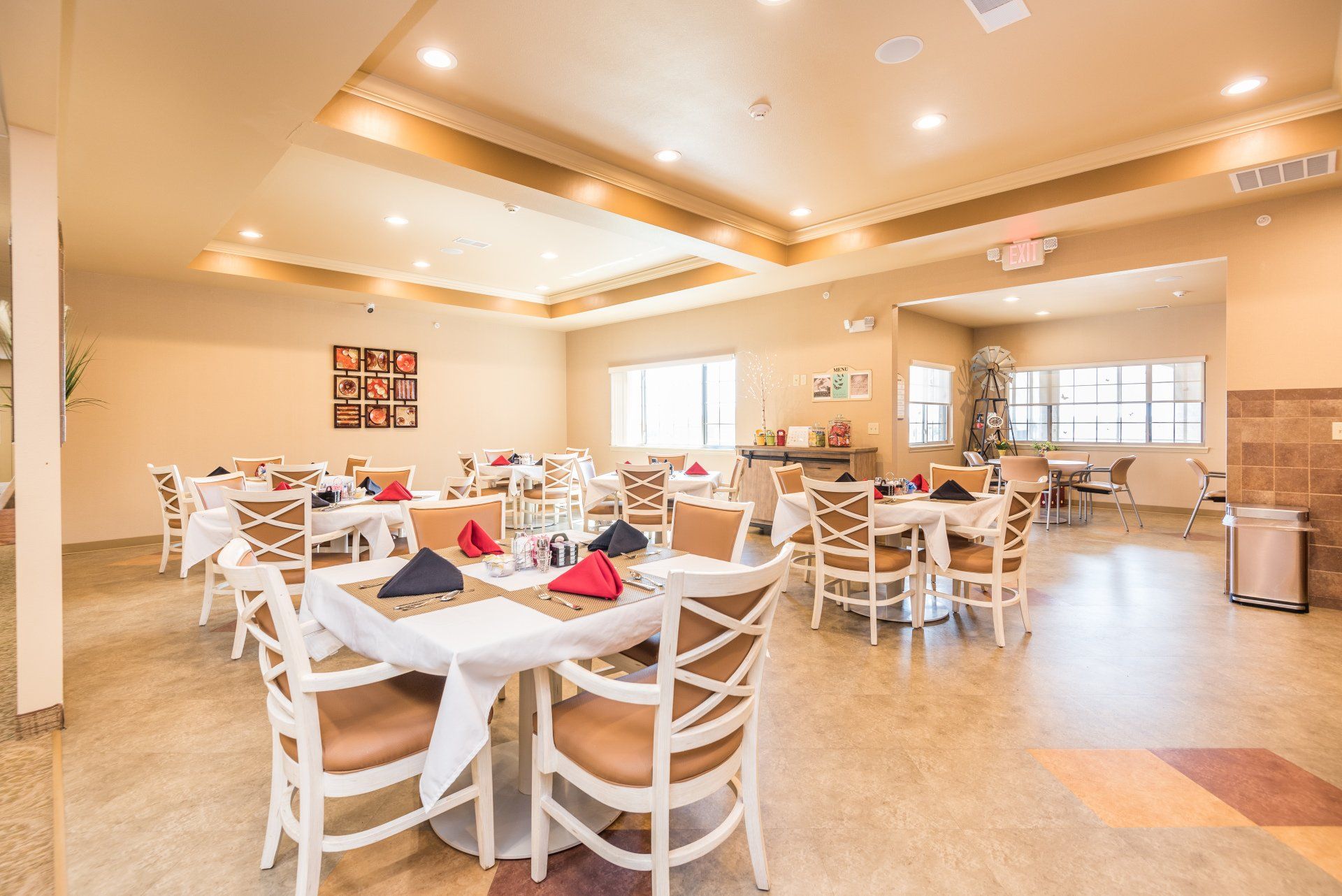 A large dining room filled with tables and chairs.